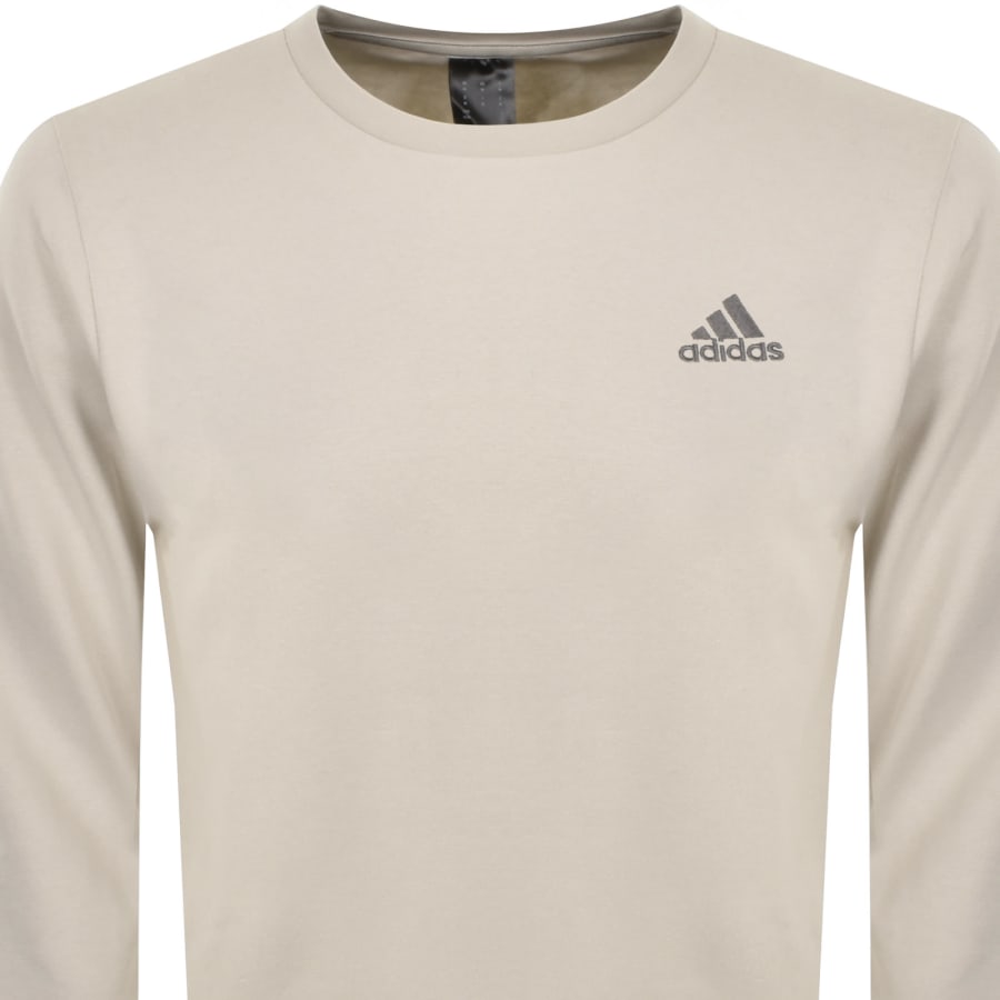 Cream adidas sweatshirt 2025